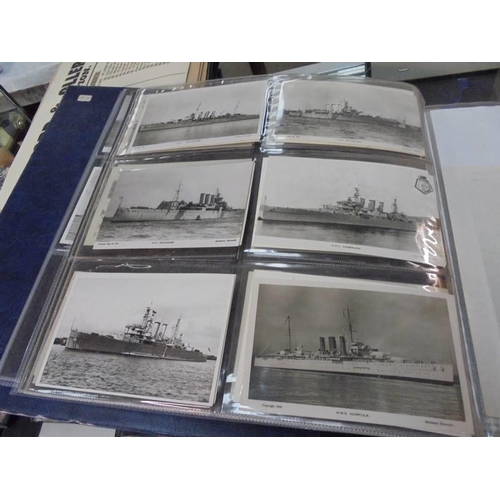 2078 - A large collection of approximately 1000 battleship & submarine related postcards in four albums and... 