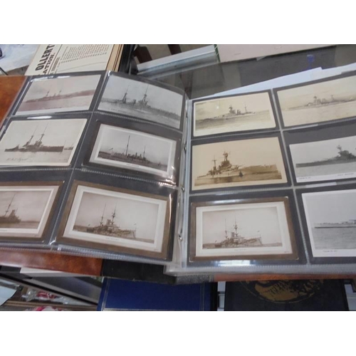 2078 - A large collection of approximately 1000 battleship & submarine related postcards in four albums and... 