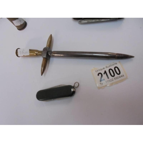 2100 - An item of trench art, three vintage pen knives etc.,