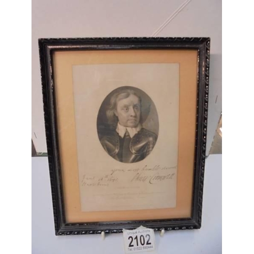 2102 - A framed and glazed engraving of Oliver Cromwell published by Chapman and Hall, 1845.