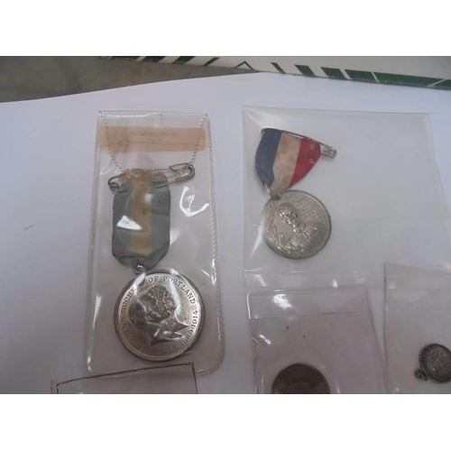 2120 - A collection of old coins and medals.