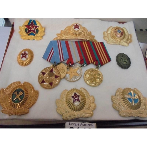 2146 - A collection of replica Russian medals and badges.