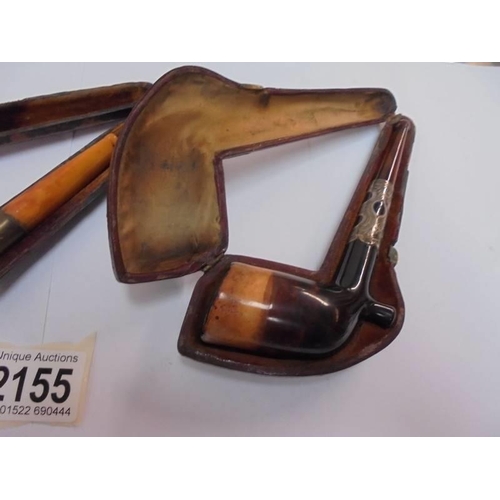 2155 - Two cased vintage pipes.