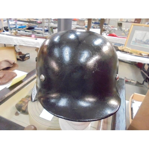 2236 - A WWII German artillery helmet 3592, ET62.