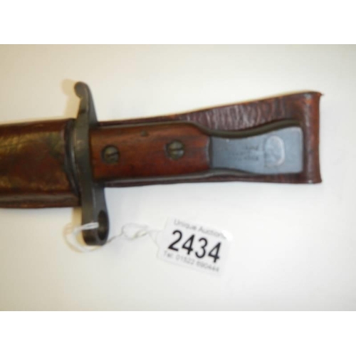 2434 - A Ross Rifle Co., Quebec patented 1907 bayonet with leather scabbard.