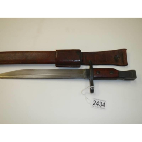 2434 - A Ross Rifle Co., Quebec patented 1907 bayonet with leather scabbard.