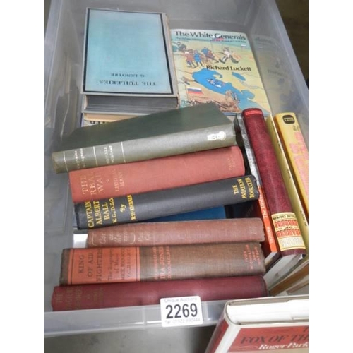 2269 - A good box of military related books.