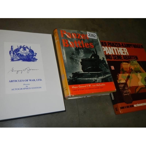 2282 - An autographed edition of Panzerheld by Gregory T Jones and two other tank related books.