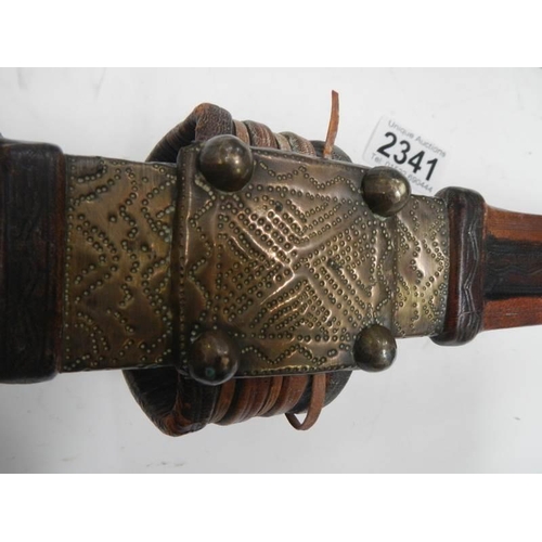 2341 - An early tribal arm fitting dagger.