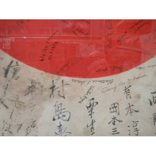 2355 - An original framed and glazed Japanese flag from end of WW2 with signatures of Japanese and USA gene... 