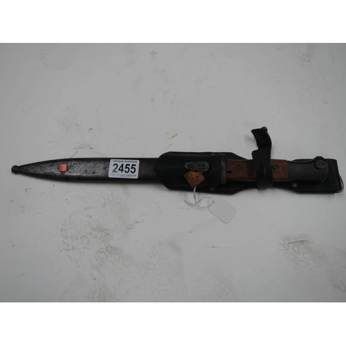 2455 - A K98 bayonet stamped COF44, serial No. 6959 with scabbard and frog.