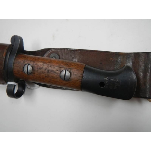 2457 - An English bayonet by EFD dated 1903 with scabbard and frog.