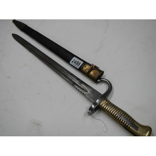 2486 - An M1868 bayonet NO. V456 with saw back blade dated 1888.