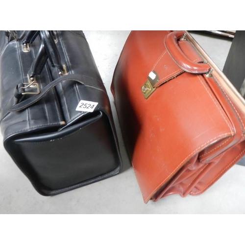 2524 - A leather briefcase and one other.