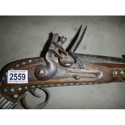 2559 - A 19th century Afghan Jezail rifle, COLLECT ONLY.