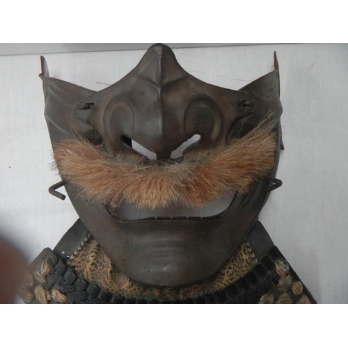 2593 - An early Samurai Menpo mask.