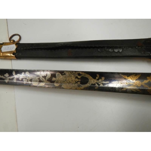 2600 - An early sword with brass hilt and in scabbard. COLLECT ONLY.