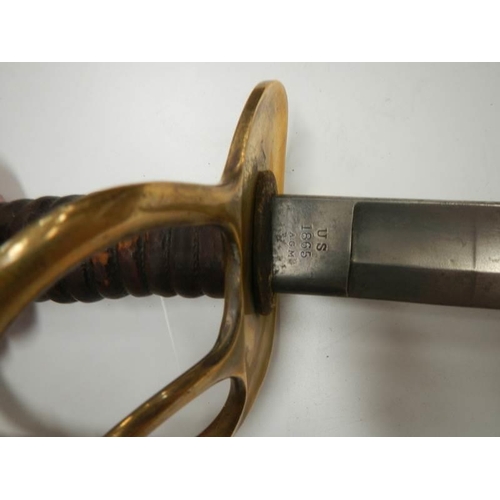 2603 - A US 1865 Sabre with brass hilt and leather grip, COLLECT ONLY.