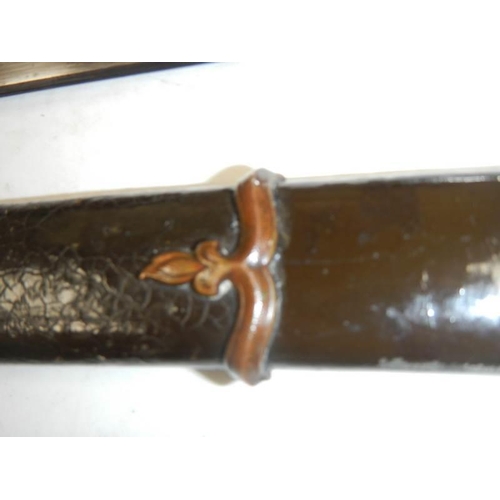 2606 - An early Japanese Samurai sword with shagreen hilt, COLLECT ONLY.