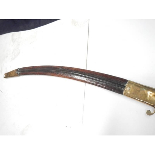 2610 - A Victorian Sabre in leather scabbard, COLLECT ONLY.