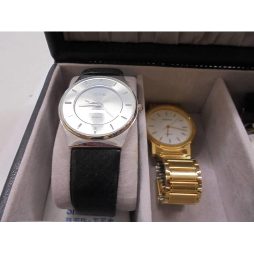 1074 - A case containing eight gents watches including Sekonda, Precision etc.,