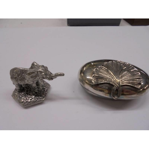 1080 - A silver pill box with elephant atop and a collection of silver plate pill boxes.