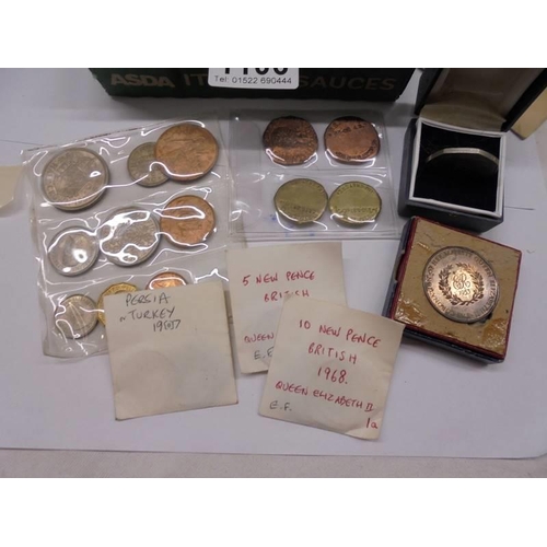 1106 - A mixed lot of UK and foreign coins.