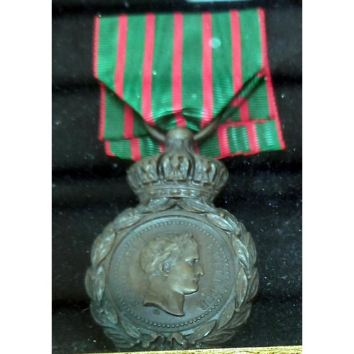 2157 - A quantity of French framed and glazed medals and medallions.