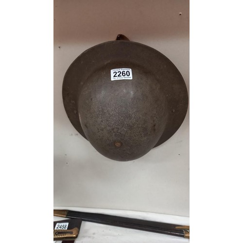 2260 - A WWI West Yorkshire Regiment helmet.