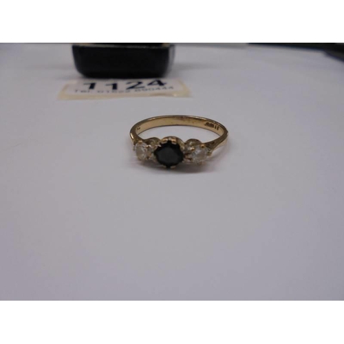 1124 - A 9ct gold ring set sapphire and white stones, size M, 1.69 grams