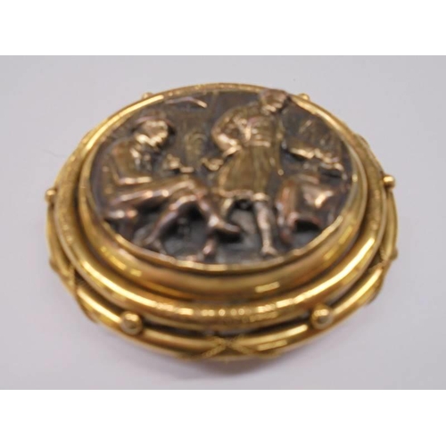 1148 - A large 19th century brooch of two gentlemen in relief with locket back and safety chain.