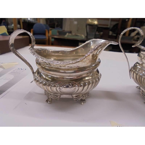 1161 - A silver sugar bowl and milk jug, Goldsmith & Co., Regent Street, 11 ounces.