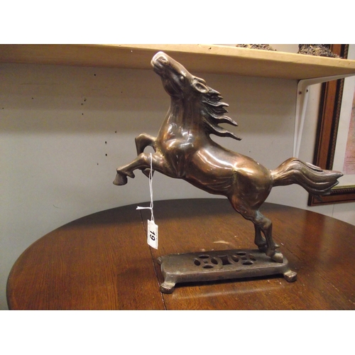 19 - A patinated brass figure of a rearing horse height 31cm