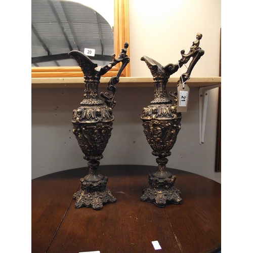 21 - A pair of ornate resin ormalu style ewers height 43cm