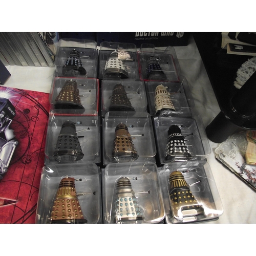 34 - A quantity of Dr Who related items, including Eaglemoss Dalek figures (12) and 3 other figures plus ... 