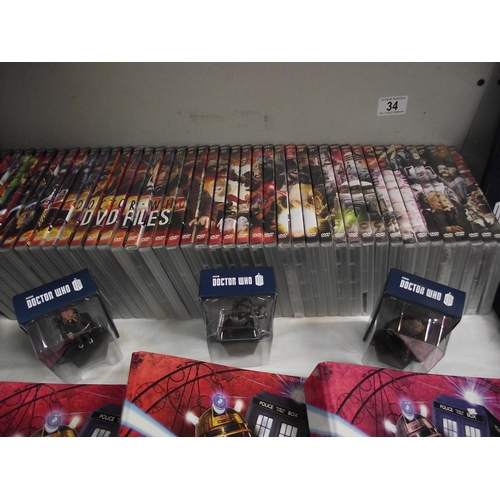 34 - A quantity of Dr Who related items, including Eaglemoss Dalek figures (12) and 3 other figures plus ... 