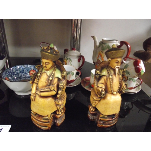 41 - A quantity of pottery including 2 oriental figures, Japanese teaset etc