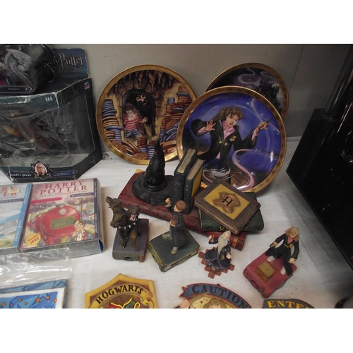 43 - A quantity of Harry Potter memorabilia including plate, figures & DVD's etc