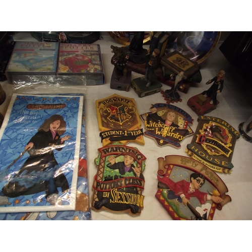 43 - A quantity of Harry Potter memorabilia including plate, figures & DVD's etc