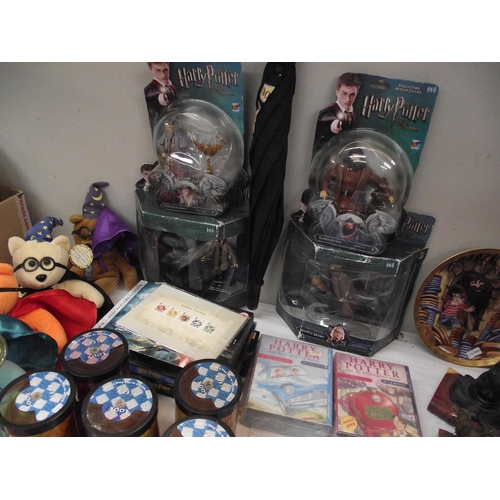 43 - A quantity of Harry Potter memorabilia including plate, figures & DVD's etc