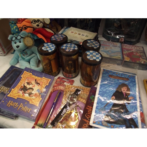 43 - A quantity of Harry Potter memorabilia including plate, figures & DVD's etc