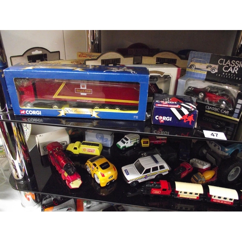 47 - A quantity of die cast cars etc including boxed items