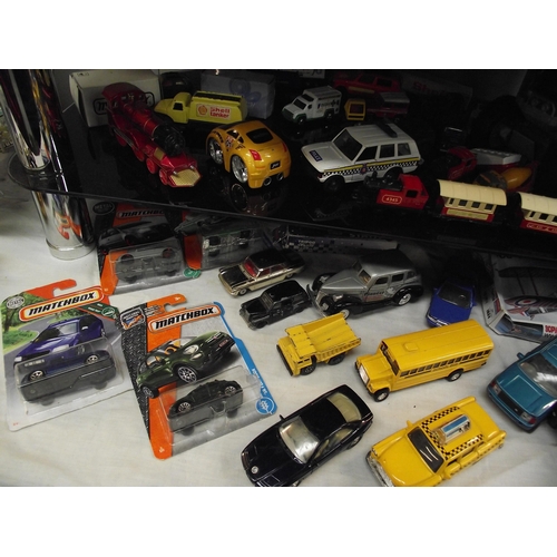 47 - A quantity of die cast cars etc including boxed items