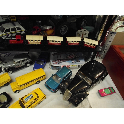 47 - A quantity of die cast cars etc including boxed items