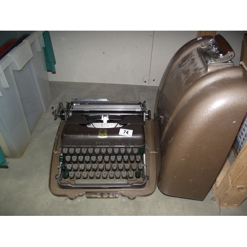 74 - A cased Imperial type writer COLLECT ONLY