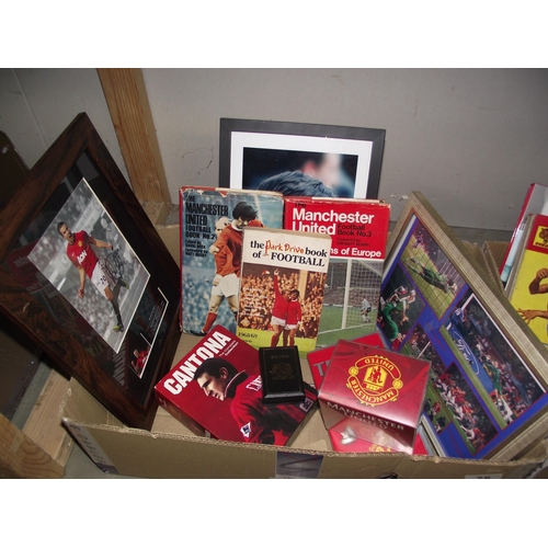 75 - A quantity of Manchester United  framed and glazed prints, books, etc