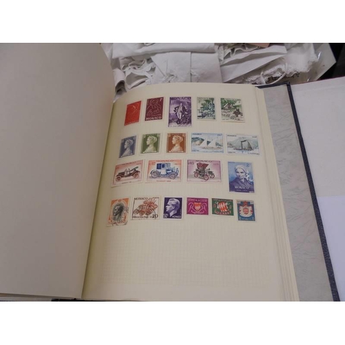 1173 - An album of European stamps and two part albums of world stamps.