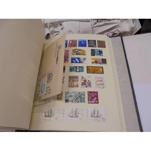 1173 - An album of European stamps and two part albums of world stamps.