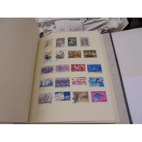 1173 - An album of European stamps and two part albums of world stamps.