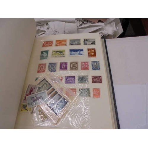 1173 - An album of European stamps and two part albums of world stamps.